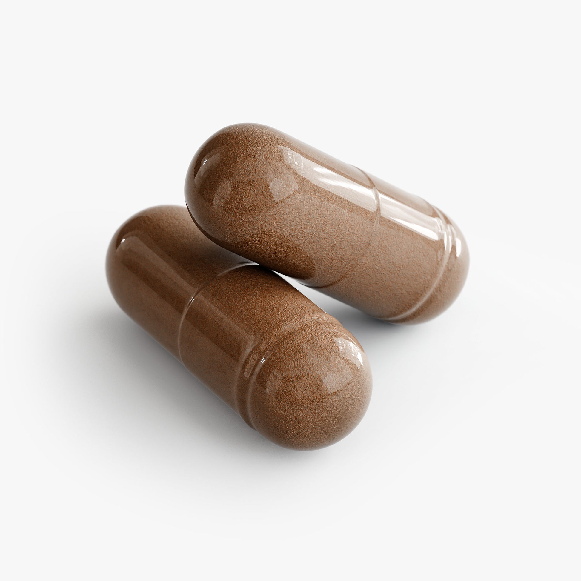 Two brown saw palmetto capsules for sexual and reproductive wellness by NATUVIBE LLC on white background